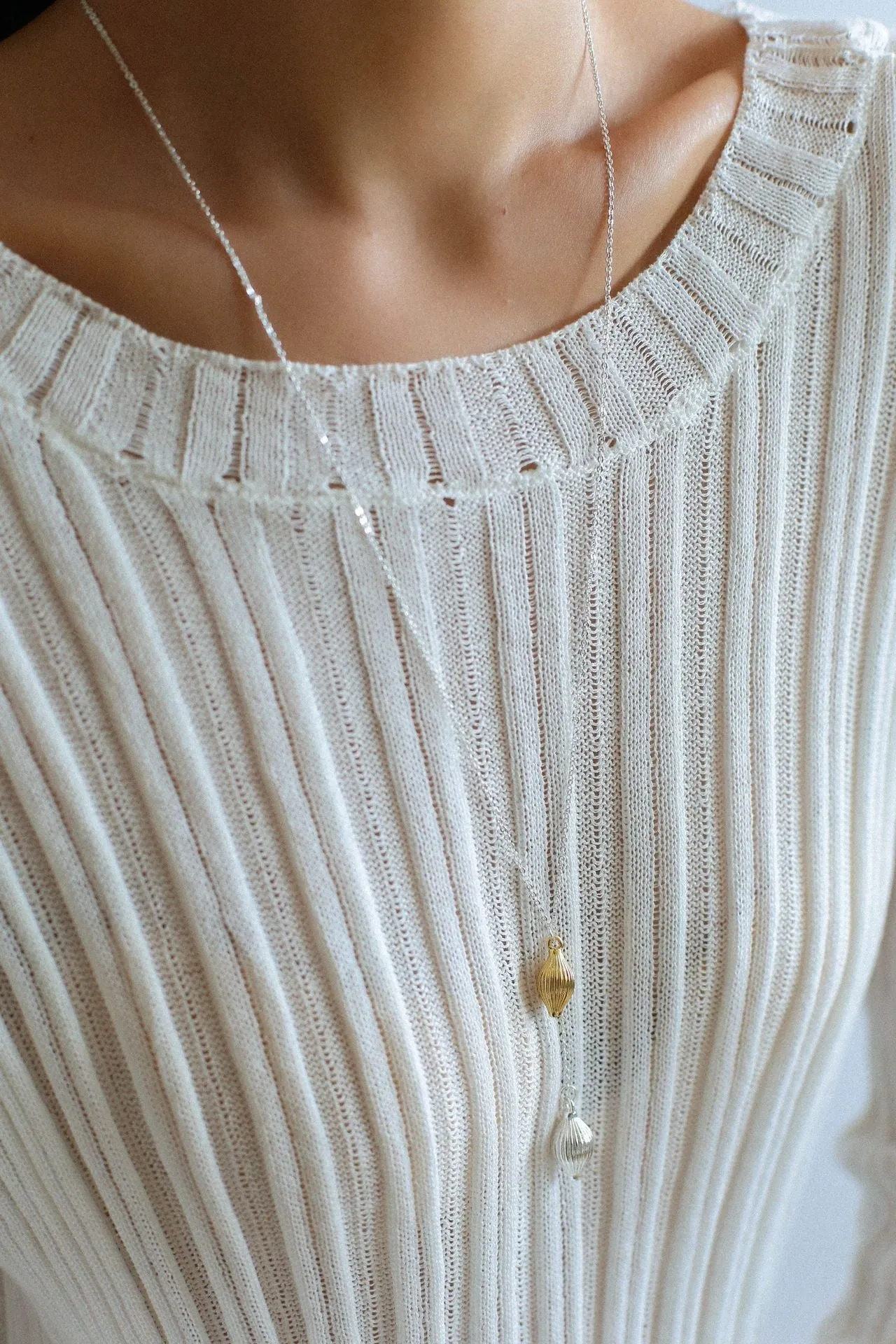 Long Gold and Silver Textured Seed Pendant Necklace