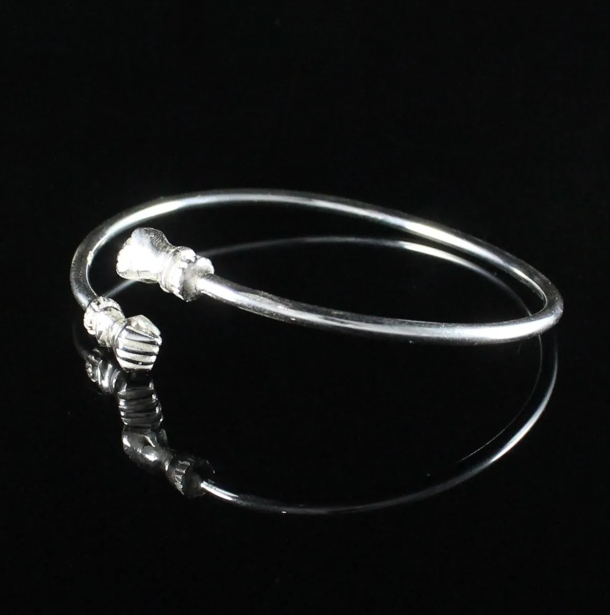 Medium Plain Fists Bangle