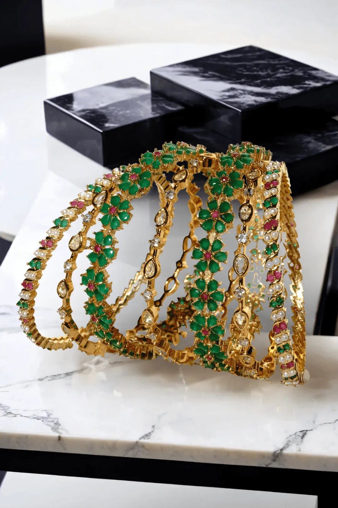 Meera 7-Piece Gold-Plated Floral Bangle Set with Ruby and Green Accents