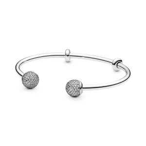 Silver open bangle with silicone stoppers and interchangeable end caps with clear cubiz ziconia