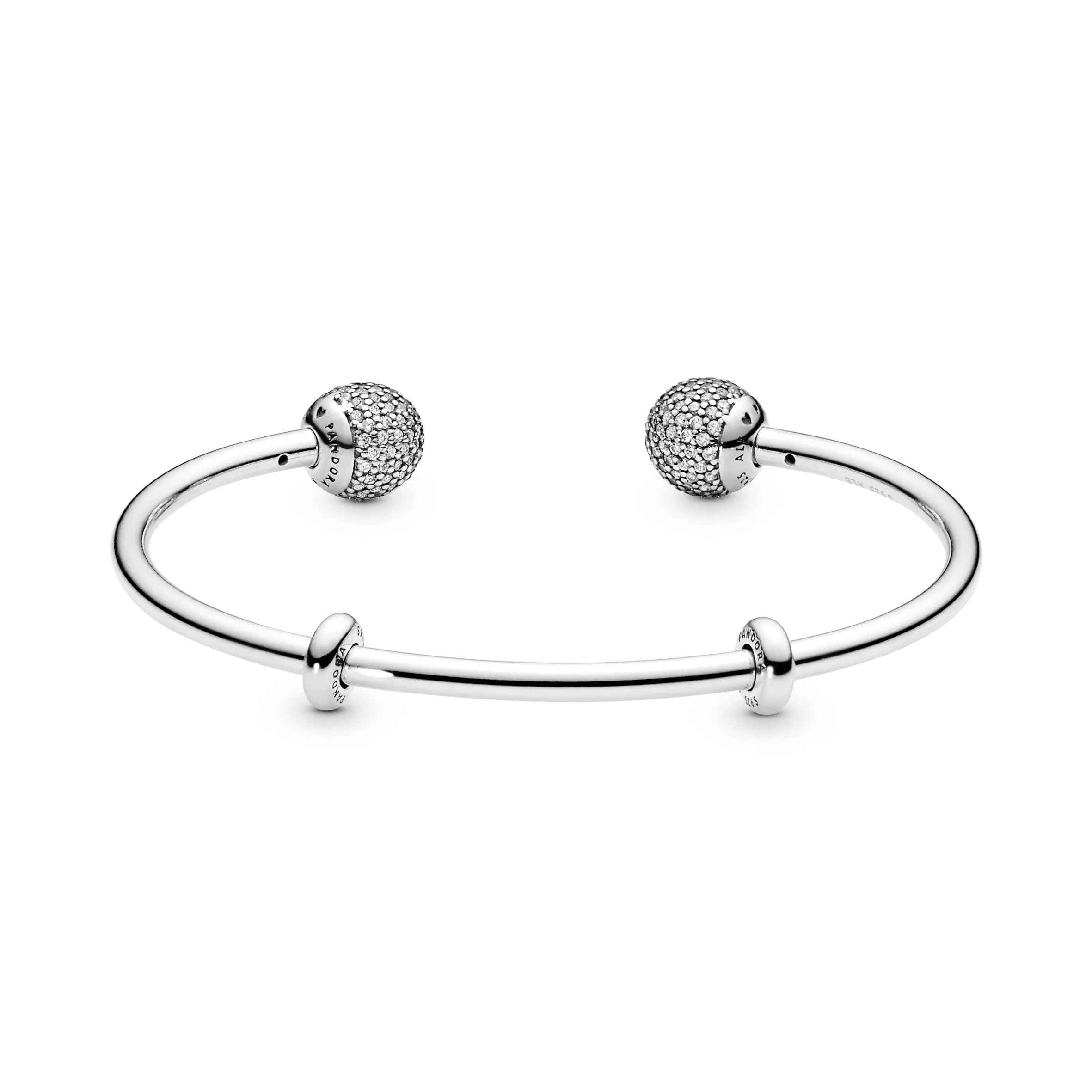 Silver open bangle with silicone stoppers and interchangeable end caps with clear cubiz ziconia